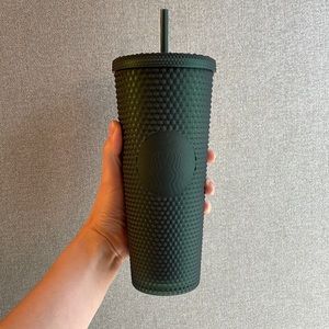 Dark green studded Starbucks tumbler